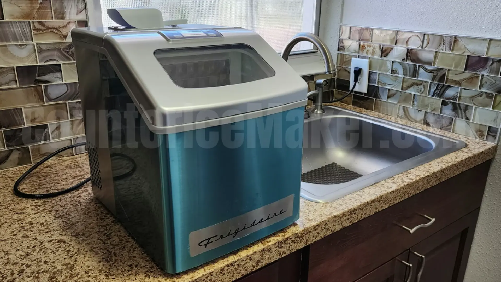 frigidaire efic452-ss on the counter and next to the sink