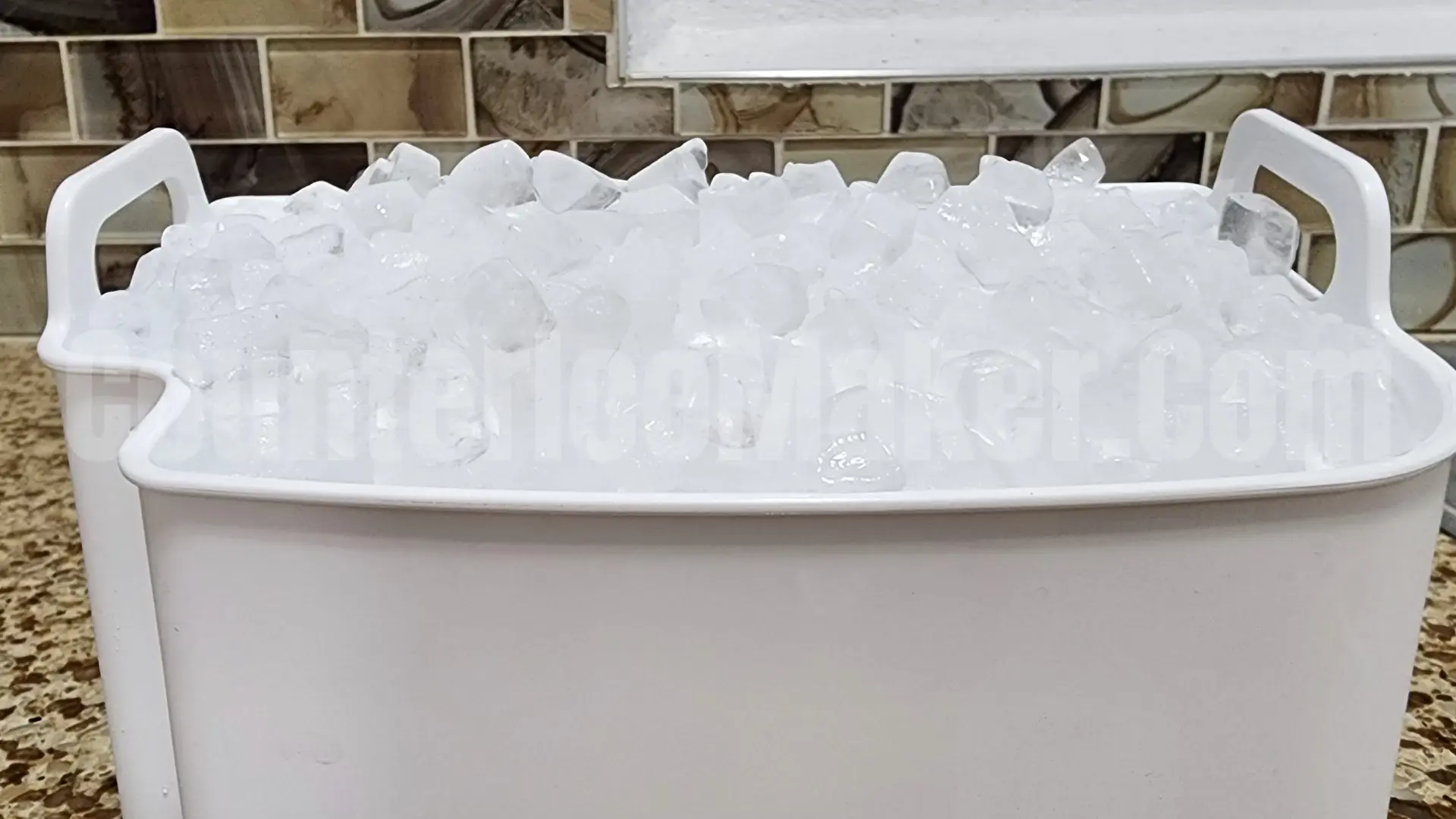 the Antarctic Star Ice Maker ice basket holds 2 pounds of ice